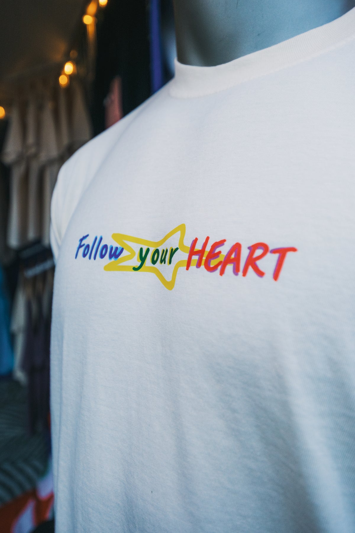 Follow your Heart ivory tee, close up of the chest print