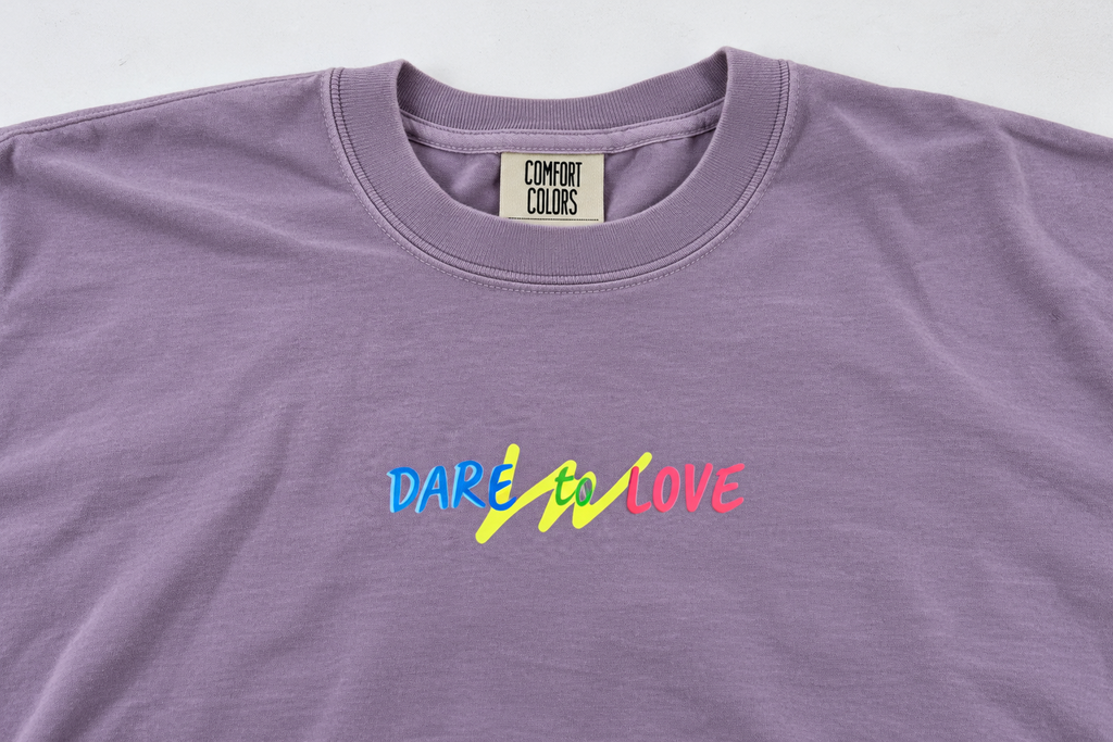 Dare to Love purple Comfort Colors tee, front